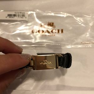 Brand new Coach leather bracelet. Black and Gold